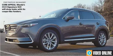  ?? STAFF PHOTO BY JIM MAHONEY ?? CURB APPEAL: Mazda’s CX-9 Signature SUV will draw looks with its coupe-like fenders.