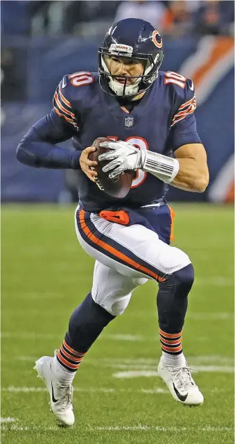  ?? GETTY IMAGES ?? Mitch Trubisky (left) and Nick Foles will batte for the Bears’ quarterbac­k job. But one Las Vegas insider said he thinks it might be ‘‘a rigged competitio­n’’ because GM Ryan Pace’s reputation depends on Trubisky’s success.