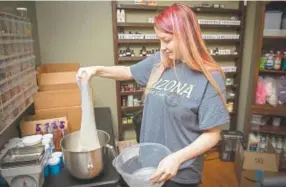  ?? Smiley N. Pool, The Dallas Morning News ?? “I was like, ‘Mom, I promise, I’m going to make a business out of this,’ ” Samantha Zumwalt, 15, said of convincing her mom to let her make slime.