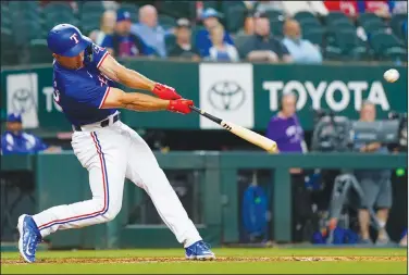  ?? Associated Press ?? In the box: Texas Rangers' Wyatt Langford flies out during the seventh inning of a spring training baseball game against the Boston Red Sox Monday in Arlington, Texas.