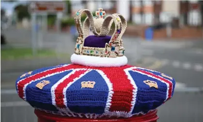  ?? Photograph: Paul Ellis/AFP/Getty Images ?? A postbox decorated for the coronation seen in Rhyl, north Wales.