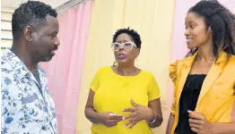  ?? KENYON HEMANS/PHOTOGRAPH­ER ?? South West St Andrew Member of Parliament Dr Angela Brown Burke (centre) in discussion with Terrian Nisbeth, principal of Tavares Gardens Primary School, and Pastor Munroe Allen, organiser of the health fair.