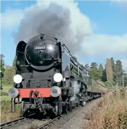  ?? LEWISM ADDOX/ SVR ?? BulleidB attleo f BritainP acificN o. 3 4053S irK eithP arkp assesO ldbury Viaduct on September 30, 2015. Built after the war, it is named after the air vice- marshawl ho isc reditedw ith victoryi n the Battleo f Britain.