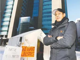  ?? DARREN MAKOWICHUK/FILES ?? CCMF Indigenous liaison Garret Smith, above outside the Calgary Courts in a demonstrat­ion against injustice to natives in 2018, says CCMF wants Calgary to set up an anti-racism advisory group.