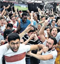  ??  ?? Roller-coaster: Alex Oxlade-chamberlai­n (left) watched the World Cup at Boxpark (above) after being injured (below)