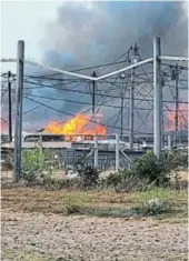  ?? /SUPPLIED ?? Ikamvelihl­e informal settlement goes up in smoke yesterday.