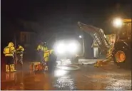  ?? TANIA BARRICKLO — DAILY FREEMAN FILE ?? A water main break on Lucas Avenue, near Dunneman Avenue, in Kingston, N.Y., is repaired on Friday.