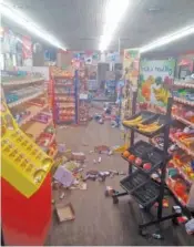  ?? MICHAEL HULL VIA AP ?? Various items litter the floor of the 4 Brothers Store in Sparta, N.C., after an earthquake shook much of North Carolina early Sunday.