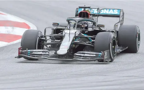  ??  ?? Mercedes' British driver Lewis Hamilton steers during the first practice session at the Austrian Formula One Grand Prix in Spielberg, Austria. - AFP