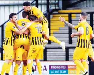  ?? PIC: Will Kilpatrick ?? THE DIFFERENCE: Boston celebrate their winner from Andi Thanoj