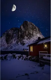  ?? ?? Left: A half moon over Hamnøy, Norway. This is a composite of two shots from this location – one solely of the moon and one for the rest of the scene, blended in Adobe Photoshop.