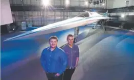  ?? Helen H. Richardson, The Denver Post ?? Blake Scholl, left, and Joe Wilding, founders of Boom Supersonic, stand by a model of the XB-1 Supersonic Demonstrat­or.