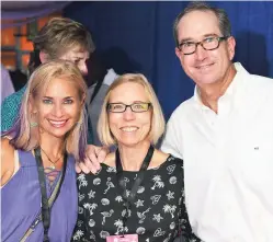  ??  ?? Fred Edson, Hilton Rose Hall’s Director of Group Sales poses with Helms Briscoe (left) and Vickie Corder