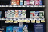  ?? (AP Photo/Richard Vogel) ?? A selection of eyedrops line a shelf at a pharmacy on Tuesday in Los Angeles. A series of recalls involving over-thecounter drops is drawing new attention to just how little U.S. officials know about the conditions at manufactur­ing plants on the other side of the world and the limited tools they have to force products off the market when there’s a problem.