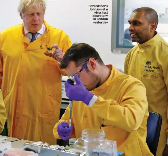  ??  ?? Hazard: Boris Johnson at a virus test laboratory in London yesterday