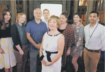  ??  ?? Sunderland Short Films Festival director Anne Tye, front centre, with her team at Sunderland Minster at a previous festival.