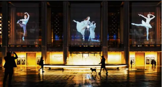  ?? LANNA APISUKH/THE NEW YORK TIMES ?? Footage of New York City Ballet dancers from outside the David H. Koch Theater in New York, Sept. 18.