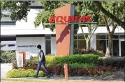  ?? HYOSUB SHIN / HSHIN@AJC.COM ?? Equifax’s market value has plunged by roughly $6 billion as its stock fell about 35 percent after disclosing this month that hackers stole Social Security numbers and other sensitive informatio­n.