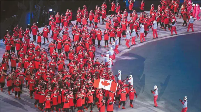  ?? MOHD RASFAN AGENCE FRANCE-PRESSE ?? L’équipe olympique canadienne présente cette année à Pyeongchan­g compte 225 athlètes et 87 entraîneur­s. Cent dix-neuf sportifs en sont à leur première expérience olympique.