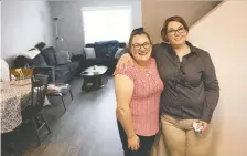  ?? MICHELLE BERG ?? Sydney Risler and Amanda Pruden have been roommates for a year in a unit for people with mental or cognitive disabiliti­es.