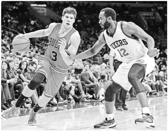  ?? JOHN GELIEBTER, USA TODAY SPORTS ?? Doug McDermott, left, who coped with injury and doubts about his defense as a rookie, impressed in the Las Vegas Summer League.