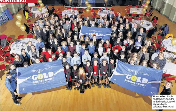  ??  ?? Great effort Pupils and teachers from the 19 Stirling district gold status schools celebrate their awards