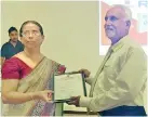  ??  ?? BTEL Director and General Manager Anoj Munidasa receiving the ISO 9001-2015 certificat­ion for Radco from SLSI Director General Nayana Satharasin­ghe