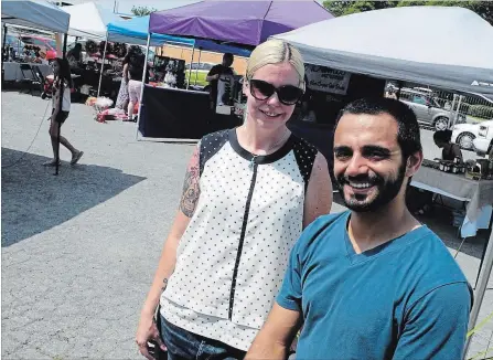  ?? JOHN LAW THE NIAGARA FALLS REVIEW ?? Lead co-ordinator Rafik Guirguis and vendor co-ordinator Ashlee Standish get another Market Niagara underway Sunday at Taps Brewery on Queen Street.