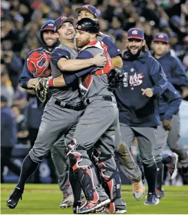  ?? JAE C. HONG/THE ASSOCIATED PRESS ?? The United States celebrates an 8-0 win over Puerto Rico in the final of the World Baseball Classic on Wednesday in Los Angeles.