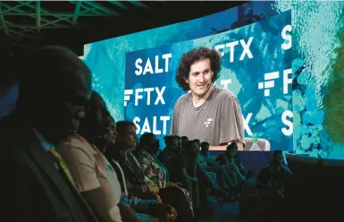  ?? ERIKA P. RODRIGUEZ/THE NEW YORK TIMES ?? FTX founder Sam Bankman-Fried leads a panel April 27 at Crypto Bahamas conference in Nassau.