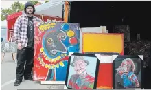  ?? KRIS DUBE SPECIAL TO THE WELLAND TRIBUNE ?? Artist Josh Vail displays some of his work at the Port Colborne Art Crawl on Saturday.