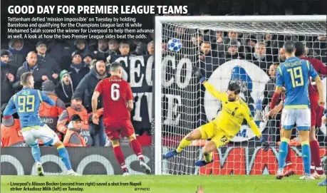  ??  ?? Liverpool’s Alisson Becker (second from right) saved a shot from Napoli striker Arkadiusz Milik (left) on Tuesday.