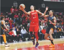  ?? KATHERINE FREY/THE WASHINGTON POST ?? Top WNBA players such as Mystics guard Kristi Toliver could earn more than $500,000 in a season under the deal reached Tuesday.
