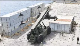  ?? U.S. Army ?? U.S. SOLDIERS last month help construct the f loating pier that will allow the maritime delivery of aid that is expected to serve half a million people in Gaza.