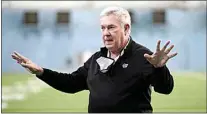  ?? GERRY BROOME / AP FILE ?? North Carolina coach Mack Brown speaks prior to his players participat­ing in the school’s Pro Day football workout for NFL scouts in Chapel Hill, N.C., in this March 29 file photo.