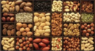  ?? DREAMSTIME ?? Nuts and seeds such as walnuts and cashews have four to 10 g of protein per 1 oz serving.