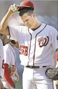  ?? AP ?? Jonathan Papelbon gets ready to exit to boos after giving up four runs in ninth inning in loss to Padres.