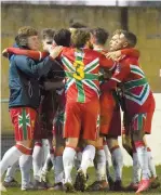  ??  ?? Windsor's players celebrate the side's second goal scored by Charlie Samuel. Ref:133229-27