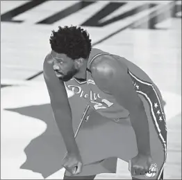  ?? KEVIN C. COX/TNS ?? 76ers’ Joel Embiid looks on during a game against the Trail Blazers on Aug. 9.