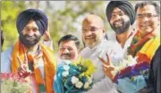  ??  ?? BJP president Amit Shah greets BJPShiroma­ni Akali Dal joint candidate Manjinder Singh Sirsa for his win in Rajouri Garden.