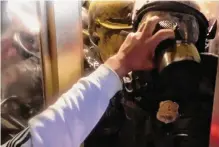  ?? U.S. Attorney court filings ?? A viral image shows Steven P. Cappuccio yanking the gas mask of D.C. police officer Daniel Hodges during the Jan. 6, 2021, riot at the U.S. Capitol. Defense attorneys say Cappuccio suffers from PTSD.