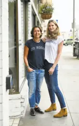  ?? Michael Short / Special to The Chronicle ?? Left: Fif Ghobadian (left) and Alice Larkin Cahan co-founded Road Twenty-Two, which makes shirts with progressiv­e messages.