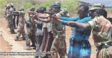  ??  ?? Chiefs and their representa­tives having a feel of live firing at Herbert Chitepo Barracks, recently.