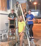  ??  ?? The founding team for New Barons Brewing Cooperativ­e begins renovation­s on a permanent home. They include, from left, Mike Mack, John Degroote, Heidi Dalibor, Sarah Hand and Matt Wittersche­in, in front.