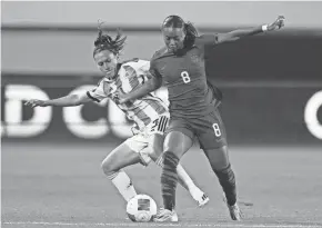  ?? RYAN SUN/AP ?? United States forward Jaedyn Shaw, front, and Argentina defender Eliana Stábile vie for the ball Friday in Carson, Calif.