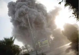  ?? KHALIL HAMRA/AP ?? Smoke rises after an Israeli airstrike on a government building in Gaza City on Saturday.