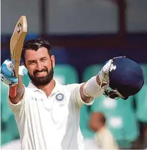  ?? AFP PIC ?? India’s Cheteshwar Pujara celebrates after scoring a century against Sri Lanka in the Second Test yesterday.