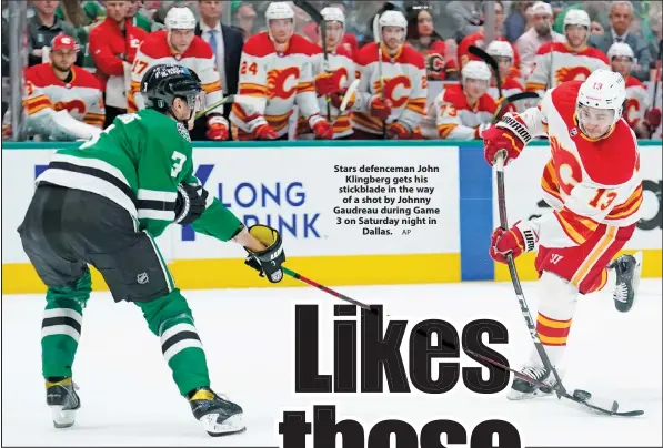  ?? AP ?? Stars defenceman John Klingberg gets his stickblade in the way of a shot by Johnny Gaudreau during Game 3 on Saturday night in Dallas.