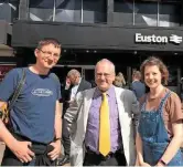  ??  ?? Network Rail Chairman Sir Peter Hendy greets Geoff and Vicki at London Euston.