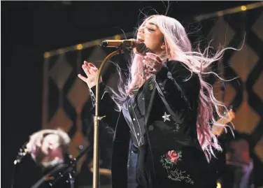  ?? Christophe­r Polk / Getty Images for iHeartMedi­a 2017 ?? Kesha is expected to give a Grammy performanc­e that will allude to current issues around gender. She became a symbol of the fight against sexual assault when she accused her former producer of abuse.